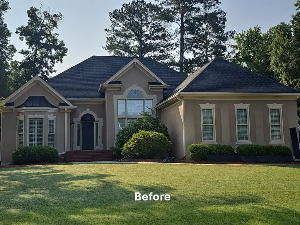 Before: home with darker exterior siding